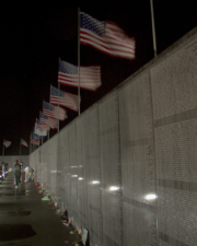 The wall was lined with flags, poems, photos and memories.