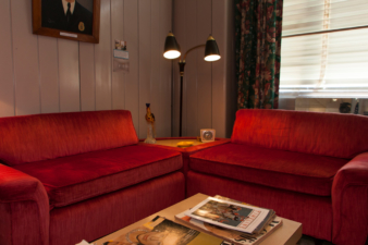 A nice corner couch with a table in between.