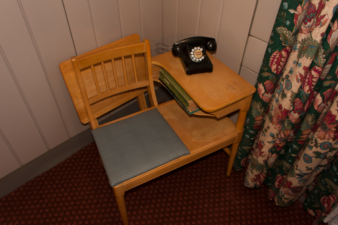 A sitting table especially made for making phone calls.