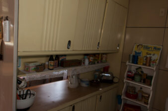 A closer look at the pass-through between the kitchen and living room. It also offered storage and counter space.