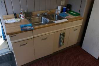 A spare sink was installed inside the Lustron garage.