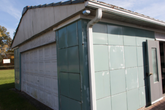 A somewhat rare Lustron garage was next to the society's headquarters.