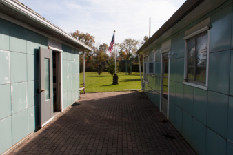 A nice walkway between the home and the adjacent garage.