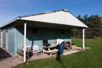 There was a covered area on the back side of the garage. One of our members is preparing his drone to record aerial video.
