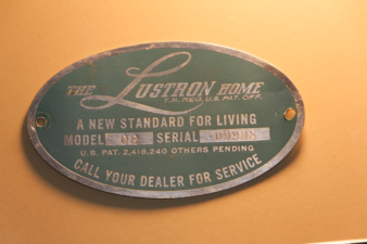 The original authentication badge for the historical society's Lustron home.