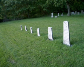 A very straight row of graves.