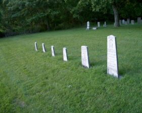 A very straight row of graves.