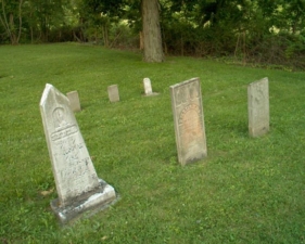 A few tombstones from the 1850s were in the rear corner of the cemetery.