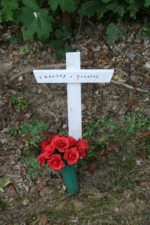 A small wood cross marked the final resting place for Charley Presley.